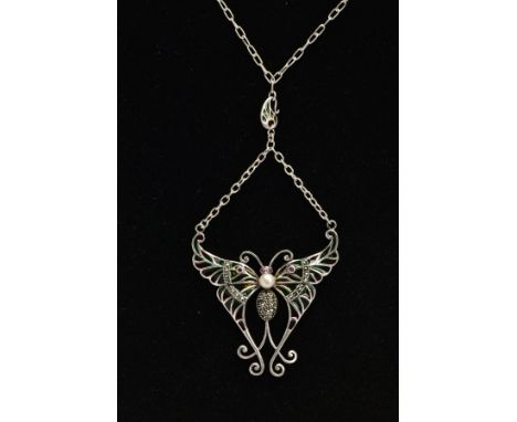 A PLIQUE A' JOUR BUTTERFLY NECKLACE, a white metal butterfly set with four circular cut rubies, a white cultured pearl and ci