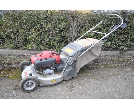 A LAWNFLITEPRO 553HRS SELF PROPELLED PETROL LAWN MOWER with a Honda 5.5 OHV engine and grass box (engine pulls and starts fir