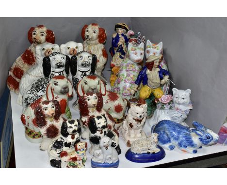 A COLLECTION OF MAINLY REPRODUCTION  STAFFORDSHIRE AND STAFFORDSHIRE-STYLE MANTEL DOGS, FLATBACK FIGURES AND OTHER CERAMIC WA