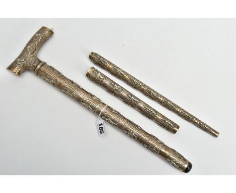 AN ASIAN WHITE METAL WALKING CANE, embossed religious figures throughout, can be taken apart into three smaller pieces, stamp