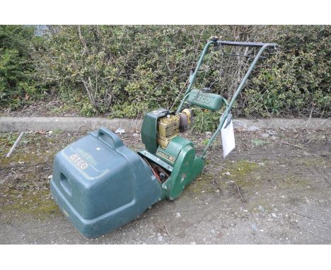 AN ATCO COMMODORE B12 PETROL CYLINDER MOWER with grass box (engine pulls freely and starts)