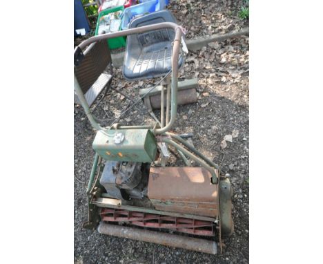 AN ATCO ROYALE B30 RIDE ON CYLINDER LAWNMOWER, with a 30' cylinder blade, and roller seat (engine turns, unknown when last st