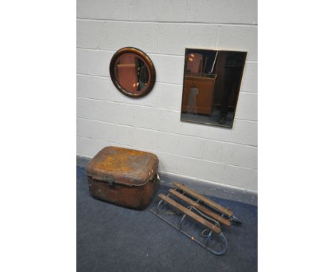 AN EARLY 20TH ALBANY COPPER CIRCULAR MIRROR, a tin trunk, a vintage sleigh, another mirror and two table lamps (6)