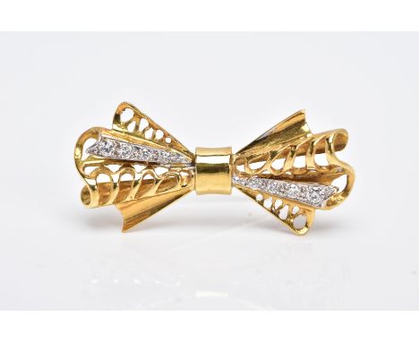 A LATE 20TH CENTURY 18CT GOLD DIAMOND BOW BROOCH, estimated modern round brilliant cut diamond weight 0.20ct, measuring appro