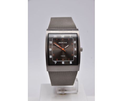 A GENTS 'BERING' WRISTWATCH, rectangular dark silver dial signed 'Bering, Titanium', Arabic numerals, silver hands, within a 