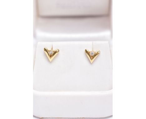 A MODERN PAIR OF DIAMOND STUD EARRINGS, estimated total modern round brilliant 0.04ct, post fittings, stamped 18k, approximat