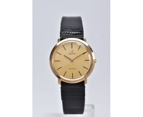 A 9CT GOLD OMEGA DE VILLE WRISTWATCH, hand wound movement, round gold dial signed 'Omega De Ville', baton markers, black hand