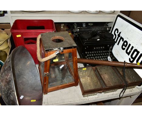 A GROUP OF COLLECTABLES, including a Royal typerwriter, a set of three Hovis bread tins in a metal frame, a red plastic Daven