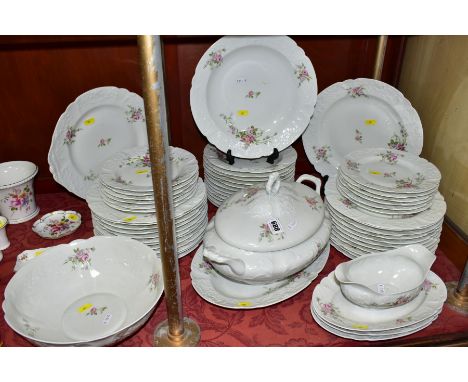 A LAFARGE &amp; CO LIMOGES PART DINNER SERVICE comprising eleven 25cm plates (five plates are chipped), twelve 21cm plates (o