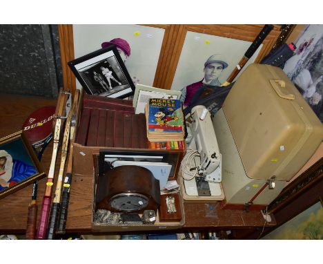 A QUANTITY OF BOOKS, PRINTS, SEWING MACHINES, WOODEN TENNIS RACQUETS, etc, including a 1931 Mickey Mouse Annual in poor condi