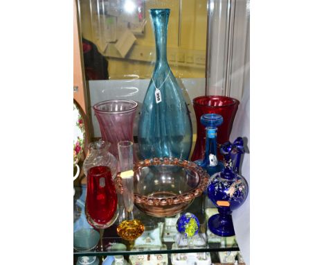 TEN PIECES OF COLOURED GLASSWARE including a blue glass vase of triform shape, with bubble inclusions, height 45cm, a moulded