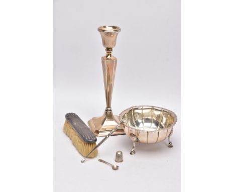 A SELECTION OF SILVER AND WHITE METAL ITEMS, to include a silver, tapered column candlestick on a weighted stepped square bas