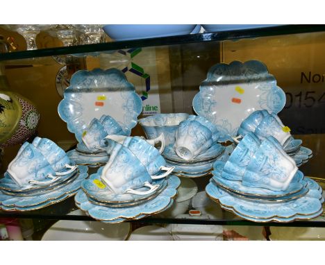AN EDWARDIAN WILEMAN &amp; CO FOLEY CHINA TRANSFER PRINTED BLUE AND WHITE TEA SET, Neo-classical design with swags, ovals and