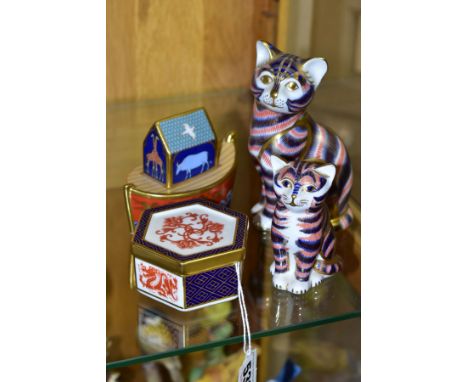 FOUR PIECES OF ROYAL CROWN DERBY, comprising a hexagonal shaped trinket box, A1295, and three paperweights 'Kitten' with gold