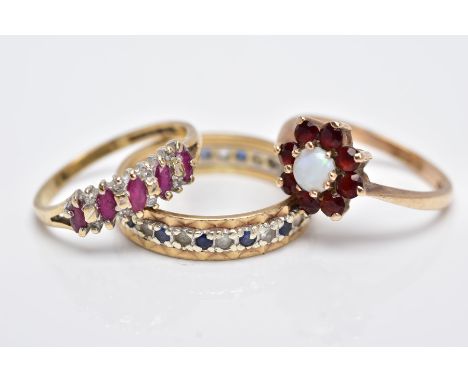 THREE 9CT GOLD GEM SET RINGS, to include a full eternity ring set with colourless spinel and blue sapphires, hallmarked 9ct g