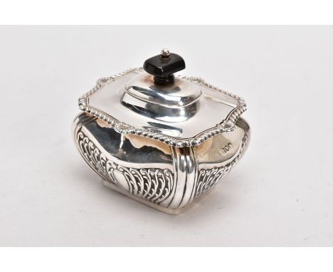 AN EDWARDIAN SILVER TEA CADDY, bomb shaped sucrier with hinged cover, gadrooned and shell cast rim, repousse foliate scrolls 