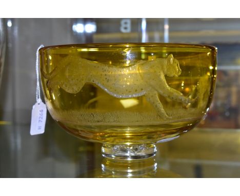 AN ENGLISH ANTIQUE GLASS FOOTED AMBER BOWL, with etched detail of Gazelle being chased by Cheetah, signed to base 'J.Everton'