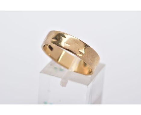 A 9CT GOLD WIDE BAND, slight textured effect, approximate width 5.5mm, hallmarked 9ct gold London, ring size N, approximate g