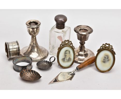 A BOX OF ASSORTED ITEMS, to include an AF silver weighted base dwarf candle, hallmarked Birmingham, another AF silver, weight