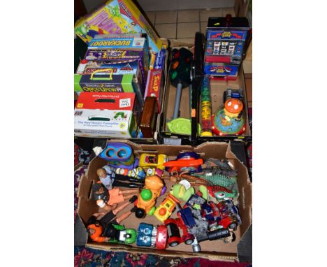 A QUANTITY OF ASSORTED TOYS AND GAMES, to include modern Action Man figures, Transformers, battery operated table top One Arm