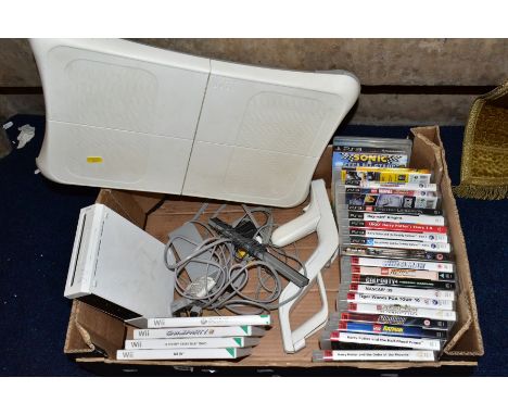 A BOX OF GAMING ITEMS, to include Wii console and Wii fit  board and game, various other games (active Personal Trainer, game