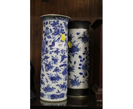 TWO CYLINDRICAL ORIENTAL CERAMIC BLUE AND WHITE VASES A/F