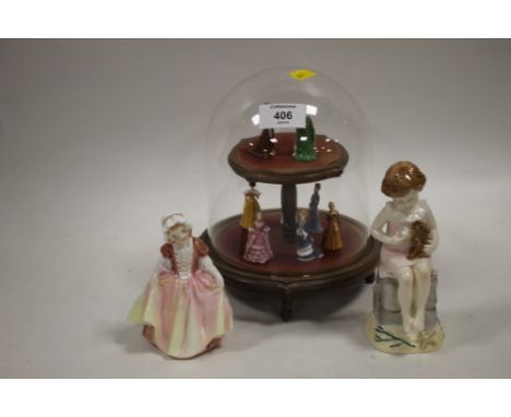 A GLASS DISPLAY DOME CONTAINING MINIATURE CERAMIC LADY FIGURES TOGETHER WITH A ROYAL DOULTON DINKY DO FIGURE AND A ROYAL WORC