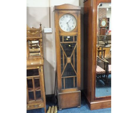 AN OAK CASED ART DECO GLAZED LONGCASE CLOCK WITH TRIPLE WEIGHT &amp; PENDULUM H 190 cm