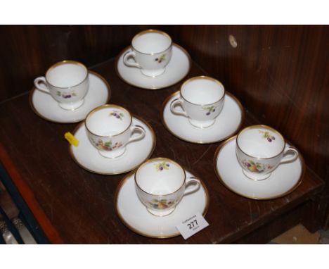 A SET OF SIX MINTON HENRY BIRKS AND SONS LTD FRUIT PATTERN CUPS AND SAUCERS SIGNED