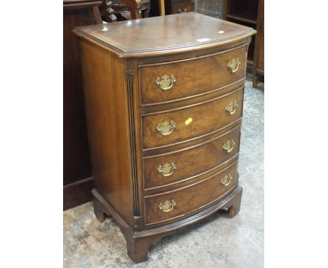 A SMALL REPRODUCTION WALNUT FOUR DRAWER BOW FRONT CHEST H 76 cm W 50 cm