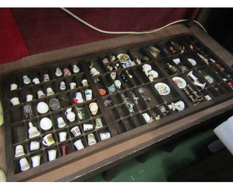 A printing block tray with contents including ceramic thimbles, ceramic figures and dolls house contents, etc