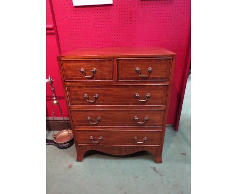 A small two over three chest of drawers on bracket feet, 75cm x 60cm x 40cm