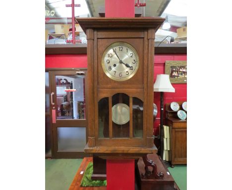 An oak cased 1930's/40's wall clock