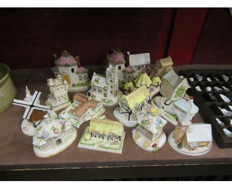 A collection of Coalport and other miniature ceramic houses (16)