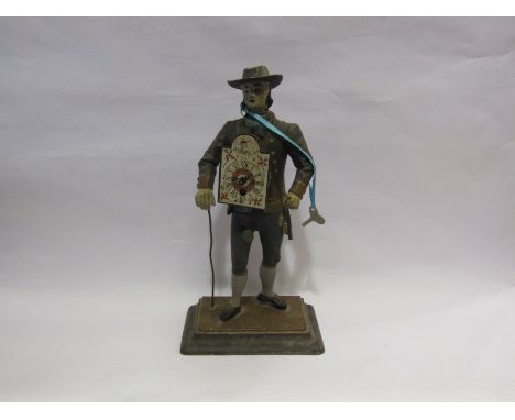 A cast metal figural clock, 39cm tall
