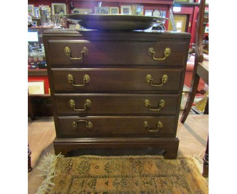 A George III style mahogany chest of small proportions the four drawers over bracket feet. 56cm x 56cm x 33cm      