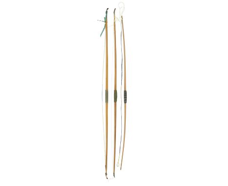 THREE LOW POUNDAGE SCOTTISH BOWS, LATE 19TH/EARLY 20TH CENTURY the first by Fergie, of thin lancewood, horn nocks and green c