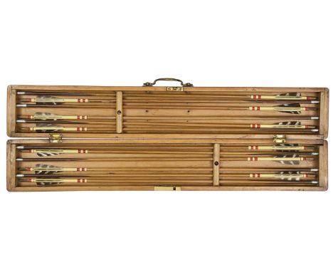 THE CASED ARROW SET OF LADY WINGATE-SAUL, EARLY 20TH CENTURY  comprising twelve matched arrows, painted cream with red bands,