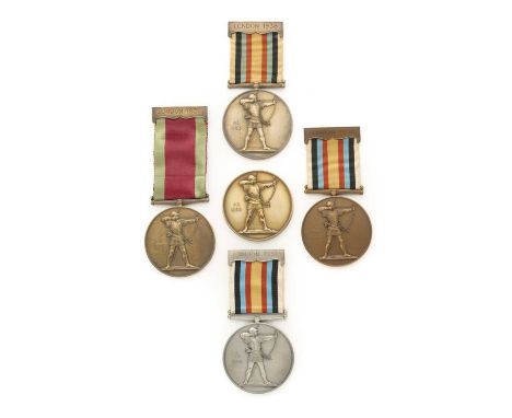 A COLLECTION OF MEDALS FROM THE 1938 WORLD ARCHERY CHAMPIONSHIP  each medal depicting a medieval longbowman aiming to the rig
