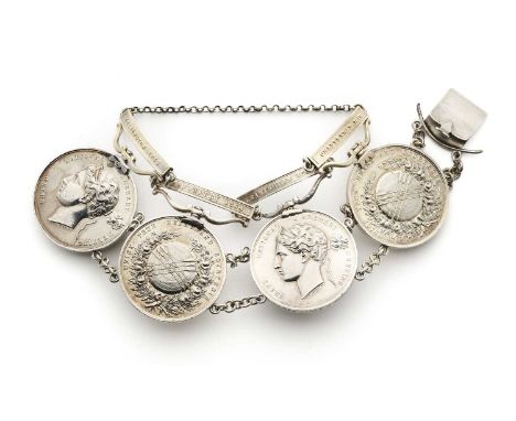 FOUR GRAND NATIONAL ARCHERY MEETING MEDALS FORMED AS A SILVER BRACELET, 1852-83  the medals from Leamington 1852, Leamington 