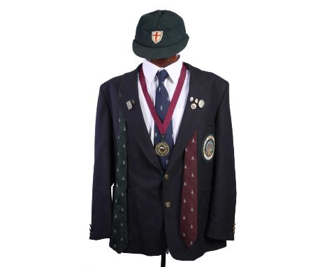 A CONTEMPORARY SOCIETY OF ARCHER ANTIQUARIES JACKET, TIES, AND FLAT CAP comprising a dark blue blazer, with copper alloy butt