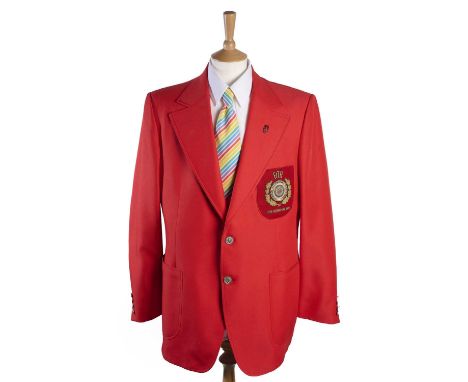 A 1976 FITA OLYMPICS JACKET of synthetic red fabric, Olympic buttons, patch on the left breast with ' FITA XXI Olympiad 1976'