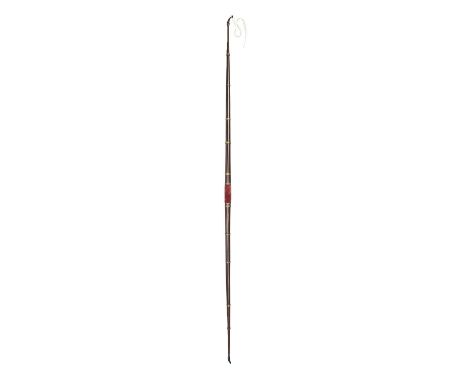 A VERY RARE EARLY LAMINATED LONGBOW, 18TH CENTURY  with four layers of various dark woods, bound with ten copper alloy rings 