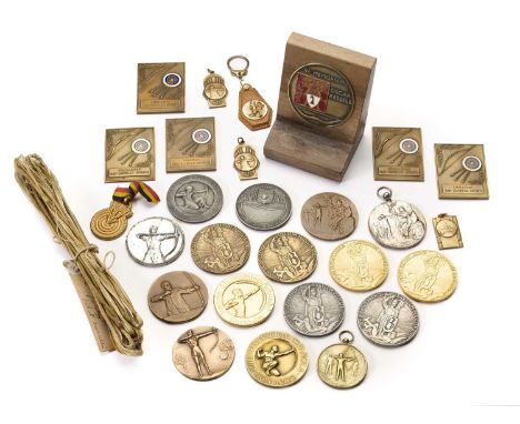 MEDALS AND MEMORABILIA FROM THE COLLECTION OF OSCAR KESSELS, 20TH CENTURY  comprising two white-metal medallions from the Wor