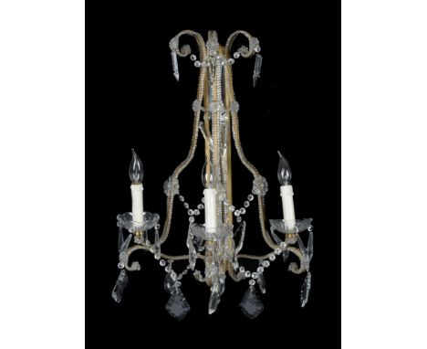 A pair of Continental, probably Italian, gilt metal and glass three light wall appliques in 18th century taste, late 20th cen