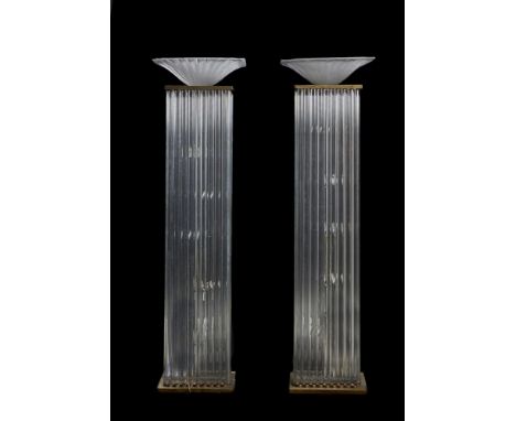A pair of glass and gilt metal mounted standard lamps in Art Deco taste, mid to late 20th century, probably French, each with