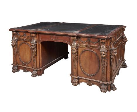 A carved mahogany twin pedestal partner's desk in George III style, late 19th/early 20th century, after the design by Thomas 