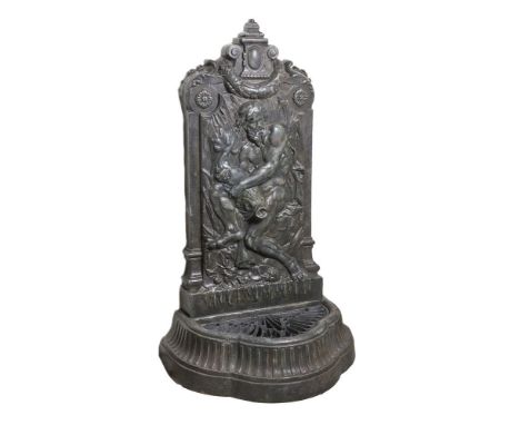 A painted cast iron wall fountain to a model by Val d'Osne, late 19th century, the shaped rectangular backplate with architec