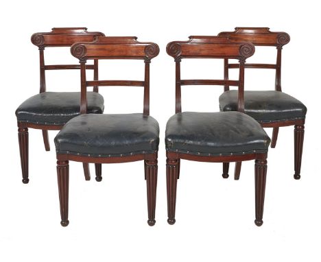 A set of six George IV mahogany and leather upholstered dining chairs, circa 1825, in the manner of Gillows, to include a pai