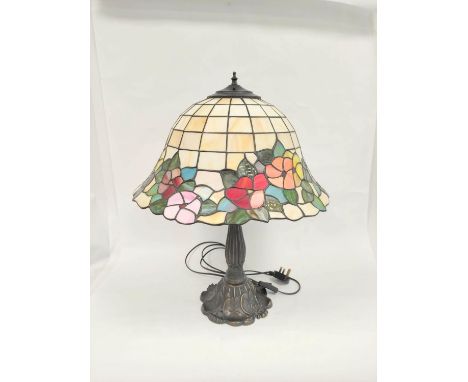 Tiffany style stained glass table lamp with&nbsp;floral motif shade on moulded base. Height 63cm Shade diameter 48cm 